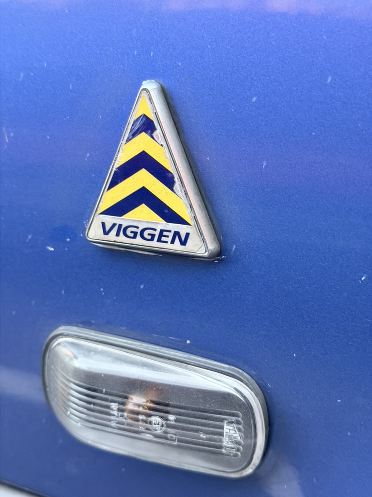 Viggen delta-wing fender badge and side marker on Lightning Blue paint