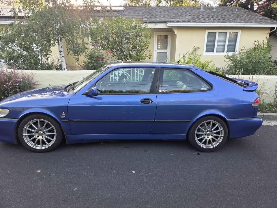 Route 8 Facebook Marketplace listing frame — Lightning Blue Saab 9-3 Viggen in driver-side profile
