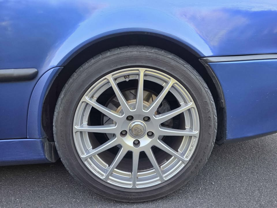 Enkei alloy wheel with a Goodyear Eagle 225/45R17 tyre on the Lightning Blue Viggen